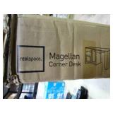 realspace Magellan corner desk, with blonde ash finish, new in box.  Measurements in pictures.