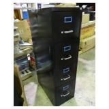 New 4 drawer file cabinet with lock and key.