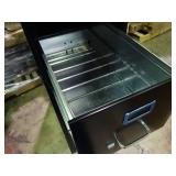 New 4 drawer file cabinet with lock and key.