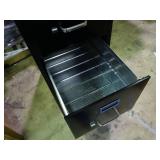 New 4 drawer file cabinet with lock and key.