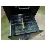 New 4 drawer file cabinet with lock and key.