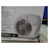 Small fan forced heater, new in box