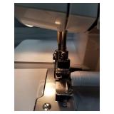 Brother Serger, 1034D, Heavy-Duty Metal Frame Overlock Machine, 1,300 Stitches Per Minute, Removeable Trim Trap, 3 Included Accessory Feet,White