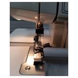 Brother Serger, 1034D, Heavy-Duty Metal Frame Overlock Machine, 1,300 Stitches Per Minute, Removeable Trim Trap, 3 Included Accessory Feet,White