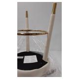 gold and cream colored stool that swivels
