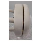 gold and cream colored stool that swivels