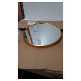 gold round mirror