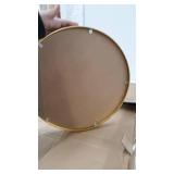 gold round mirror