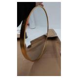 gold round mirror