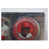 Commemorative Topps Player Medallion Card from 2020 Topps Baseball Series 2, "Aristides Aquino, Cincinnati Reds"