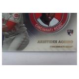 Commemorative Topps Player Medallion Card from 2020 Topps Baseball Series 2, "Aristides Aquino, Cincinnati Reds"