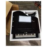 Melissa & Doug Learn-to-Play Classic Grand Piano (Mini Keyboard with 30 Hand-Tuned Keys, Non-Tipping Bench, High-Quality Materials, 23.65 H x 21.4  W x 10.05 L)