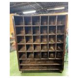 Antique wood mail sorter, rolling.