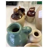 Stoneware jugs (small) some with corks, some unmarked. (see pics)