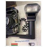 Canon 35mm camera with flash and manual