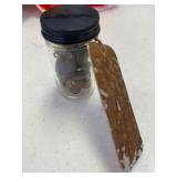 Cadet uniform coat buttons 1938, in jar with tag.