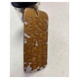 Cadet uniform coat buttons 1938, in jar with tag.