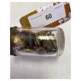 Cadet uniform coat buttons 1938, in jar with tag.