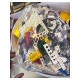 Large Qauntity 35lb container full misc legos, star wars pieces, nasa pieces and much more.