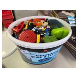 Large Qauntity 35lb container full misc legos, mega blocks, and much more.