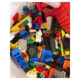 Large Qauntity 35lb container full misc legos, mega blocks, and much more.