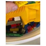Large Qauntity 35lb container full misc legos, mega blocks, and much more.
