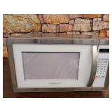 Farberware FMO11AHTPLB 1.1 Cu. Ft. 1000-Watt Microwave Oven with LED Lighting Cubic Feet, White/Platinum