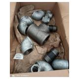 variety of large galvanized gas fittings