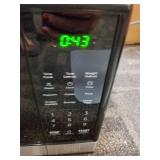 BLACK+DECKER EM031MB11 Digital Microwave Oven with Turntable Push-Button Door, Child Safety Lock, 1000W, 1.1cu.ft, Stainless Steel, 1.1 Cu.ft