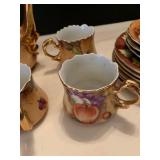 Lefton teapot, cups , bowls and plates