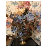 Artificial flower arrangement in brass pot