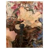 Artificial flower arrangement in brass pot