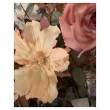 Artificial flower arrangement in brass pot