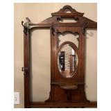 Hall tree 78 x 30 x 12 has cracks above and below mirror