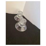 Eleven invertible candle holders for tapers and votives and two others