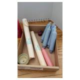 Assorted candles, tapers and matches