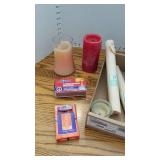 Assorted candles, tapers and matches