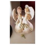 Foundations figurines (bouquet broken) and Putting God First