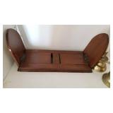 Book ends, brass candlestick, brass bell and 2 hurrican shades