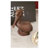 Red Mill pelican and decorative shells