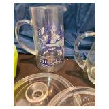 2 glass pitchers, plastic bowls and cups, random glass lids