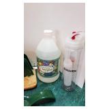 Silverware tray, napkin holder, spoon rest, vinegar (almost full) and more