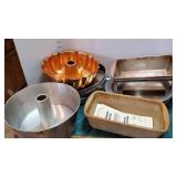 Pampered Chef stoneware loaf pan and other baking pans