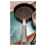 2 skillets and part of a double boiler
