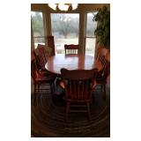Pedestal claw foot oak table (30 x 72 x 48 not including leaves), 2 captain chairs, 4 chairs and 2 leaves (10" each)