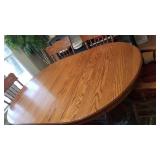 Pedestal claw foot oak table (30 x 72 x 48 not including leaves), 2 captain chairs, 4 chairs and 2 leaves (10" each)
