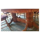 Pedestal claw foot oak table (30 x 72 x 48 not including leaves), 2 captain chairs, 4 chairs and 2 leaves (10" each)