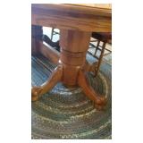 Pedestal claw foot oak table (30 x 72 x 48 not including leaves), 2 captain chairs, 4 chairs and 2 leaves (10" each)
