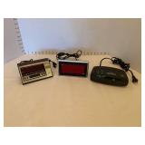 Three alarm clocks