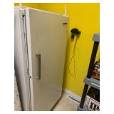 White Westinghouse upright freezer needs cleaned